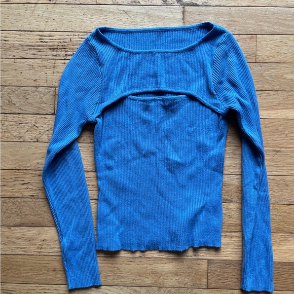 Tops - Blue sweater with cut out at the top.